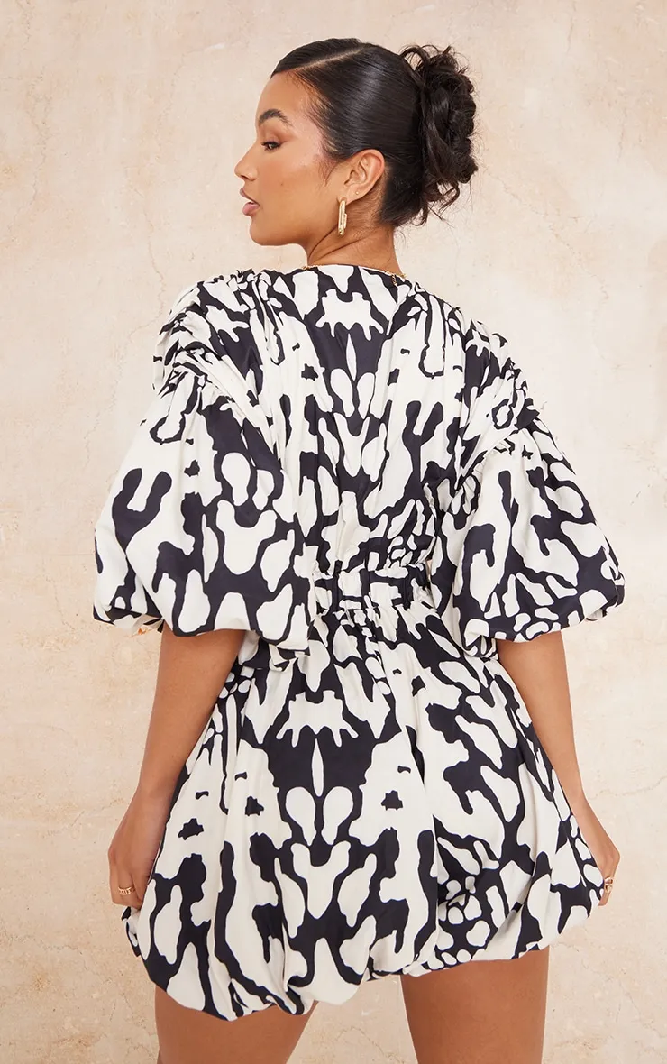 Black Print Plunge Puffball Hem Playsuit